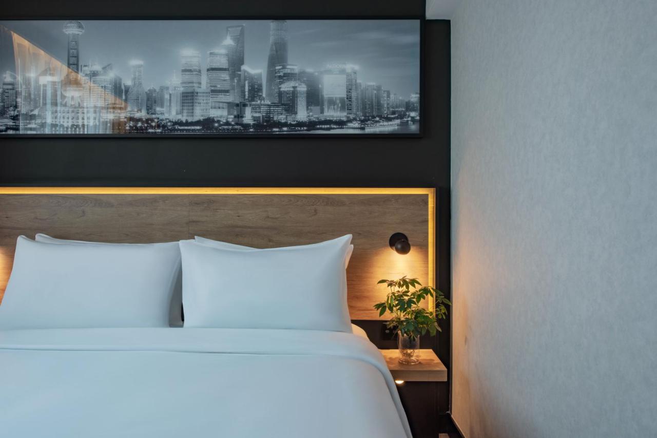 Park Inn By Radisson Shanghai Huanqiugang ภายนอก รูปภาพ