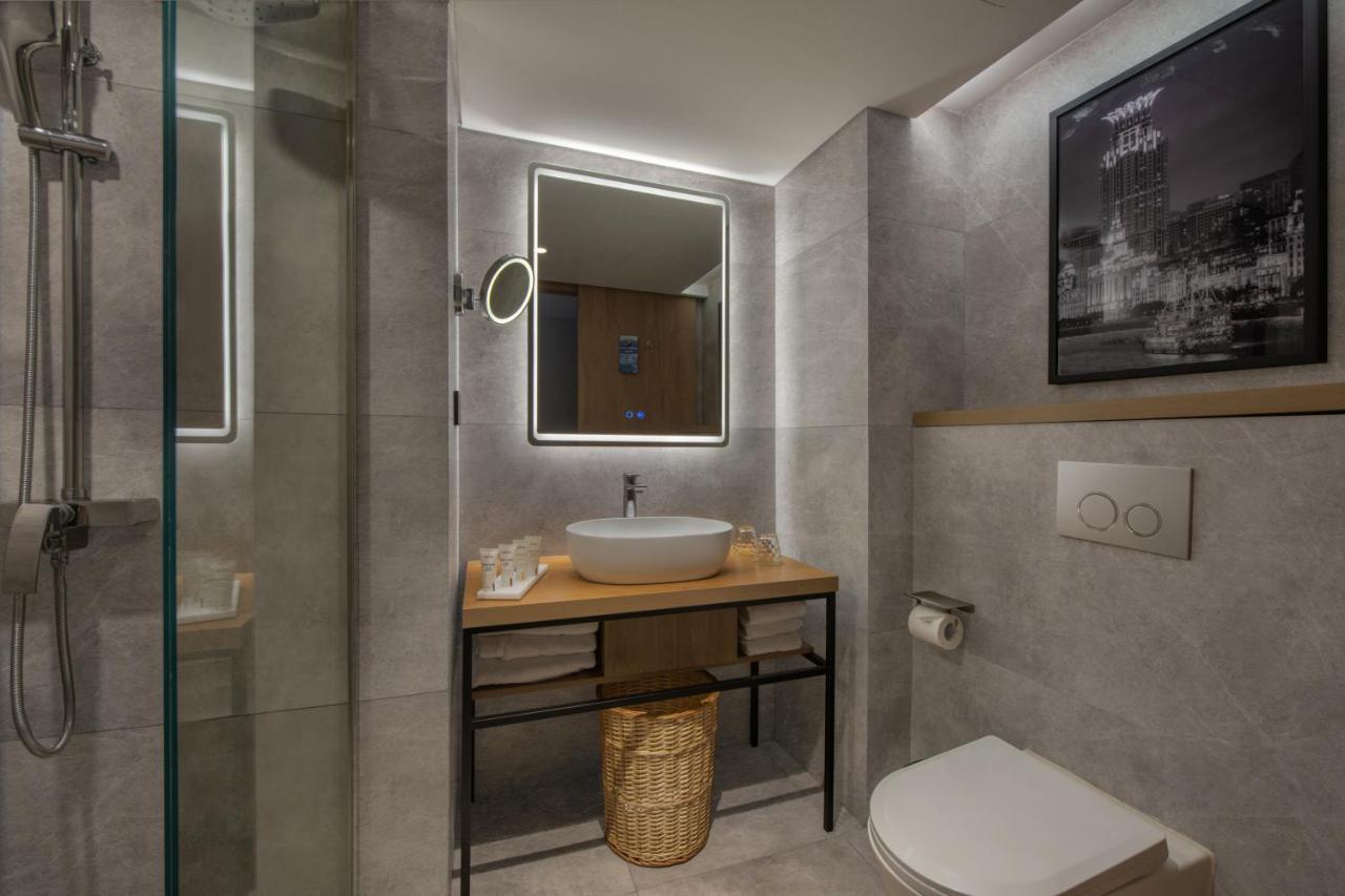 Park Inn By Radisson Shanghai Huanqiugang ภายนอก รูปภาพ